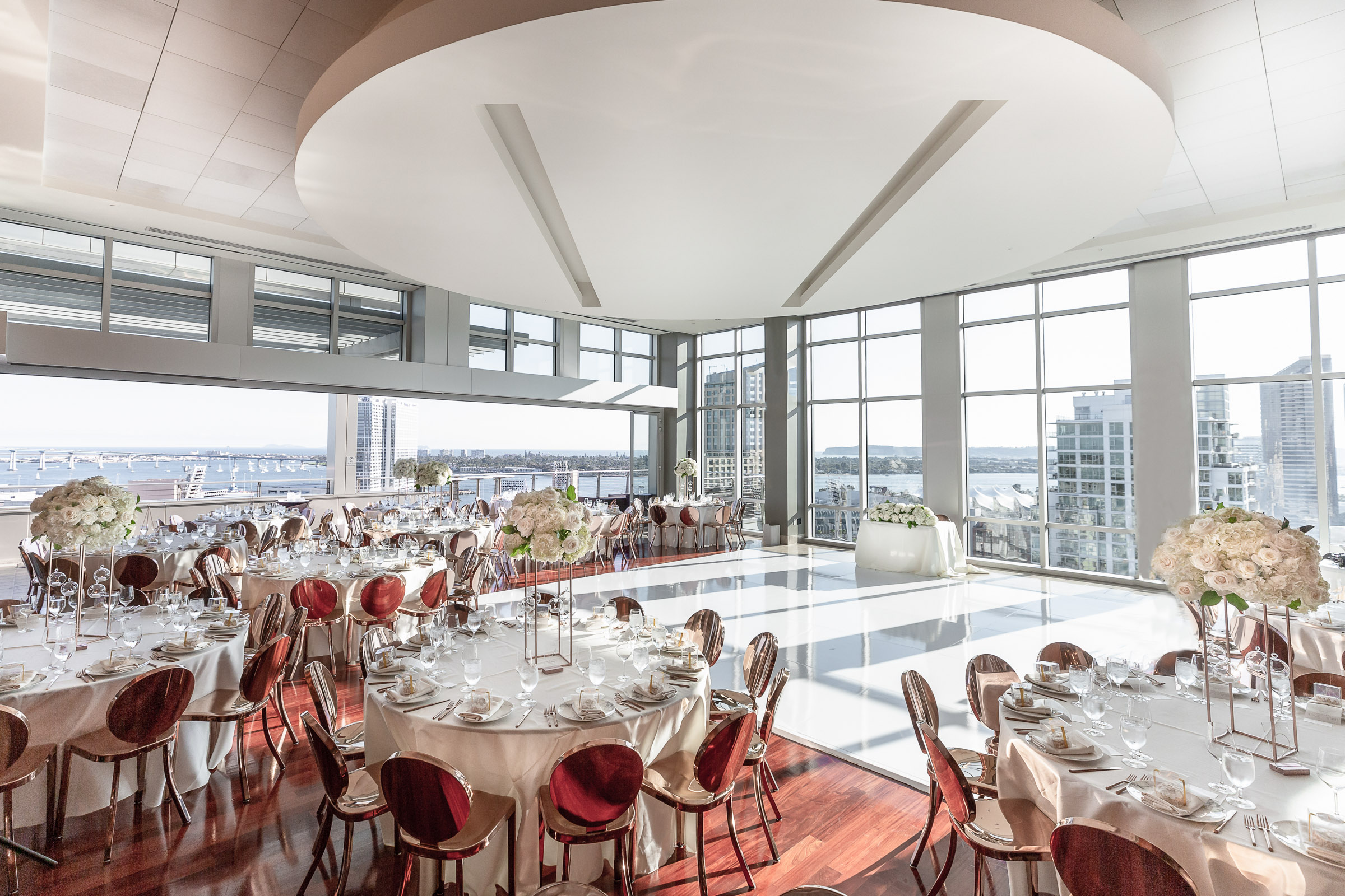 modern rose gold reception chairs and details at Ultimate Skybox Downtown San Diego by Julie Ferneau Photography